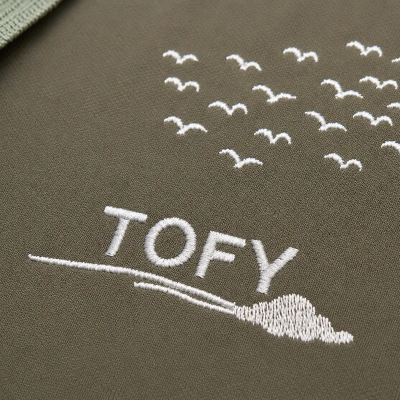 TOFY detail: Flock-of-birds embroidery