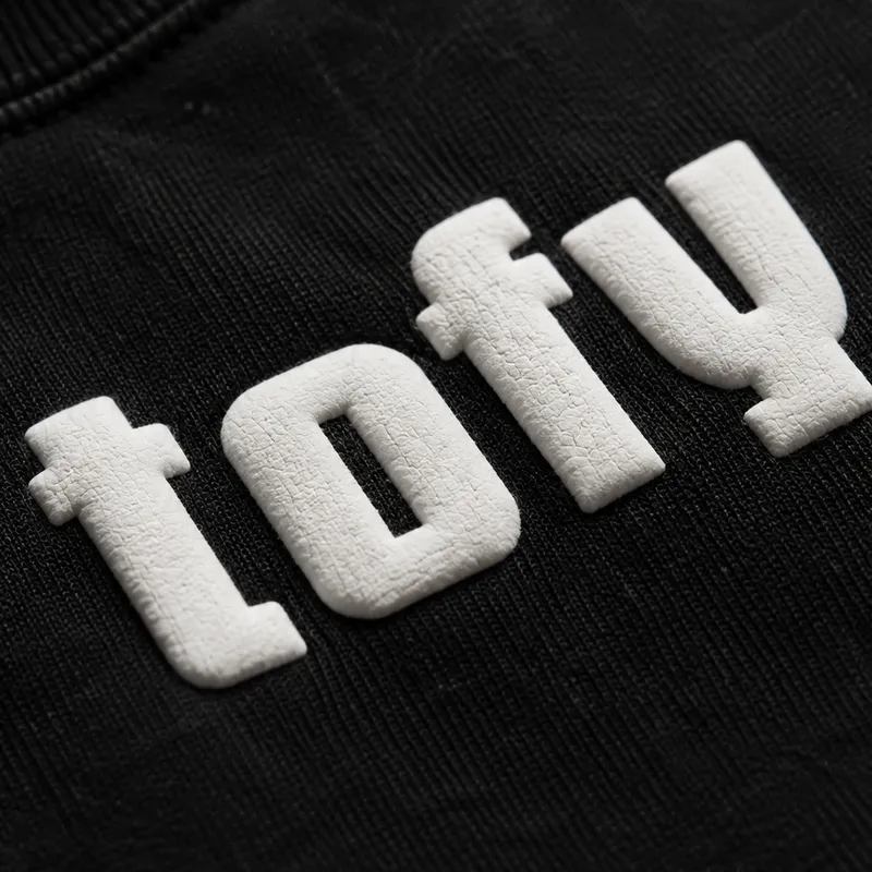 TOFY detail: Puff-print logo