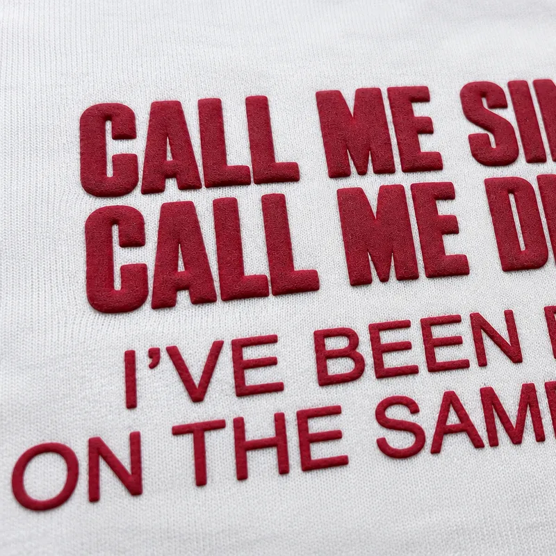 TOFY detail: Raised slogan print
